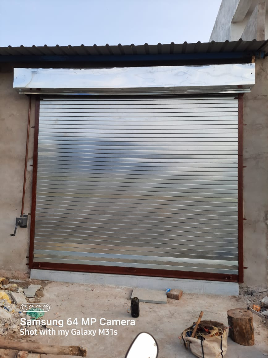 GEAR OPERATED ROLLING SHUTTER